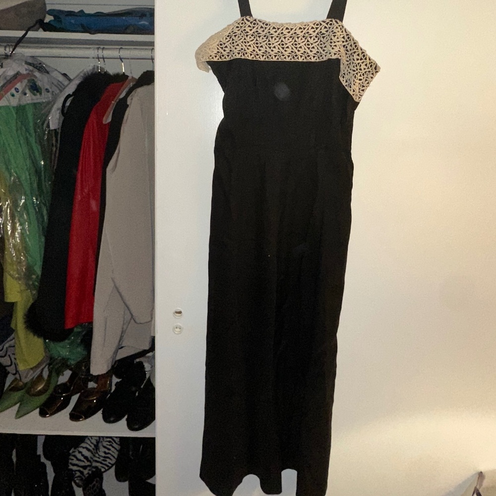 Elegant vintage black midi with lace detail—sourced from iconic C. Madeleine’s